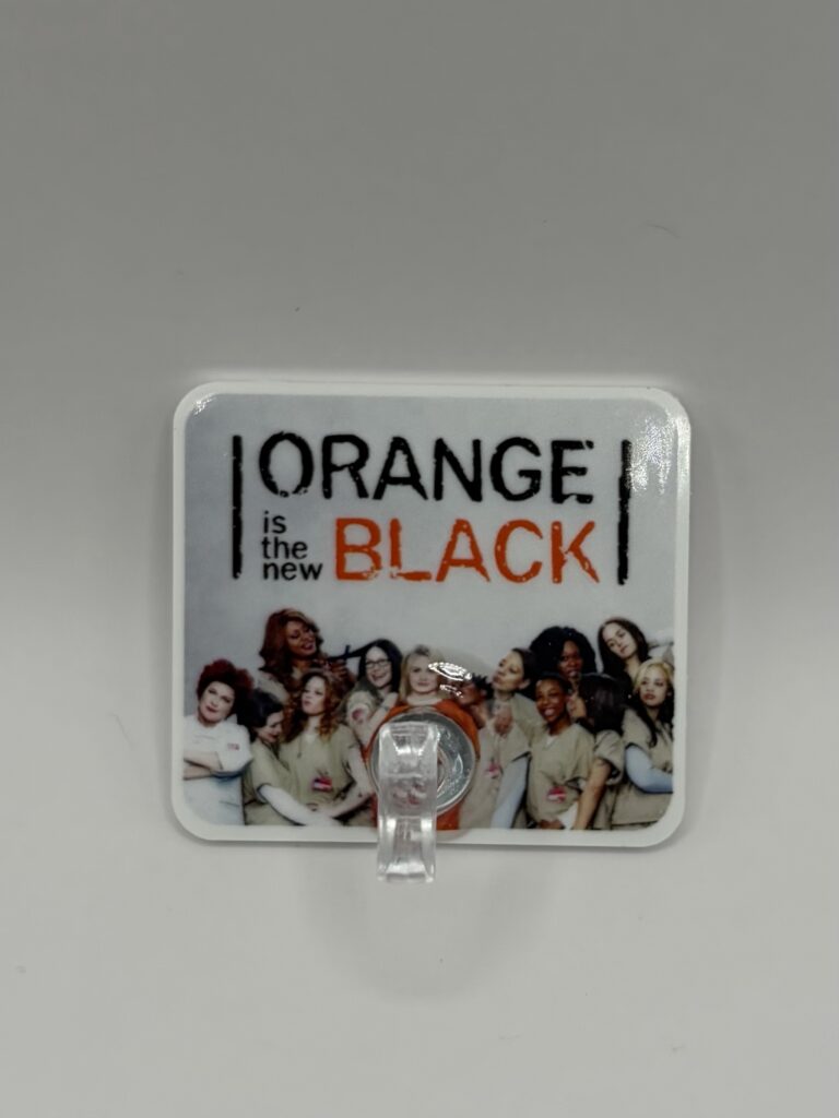 Ladies in orange stand